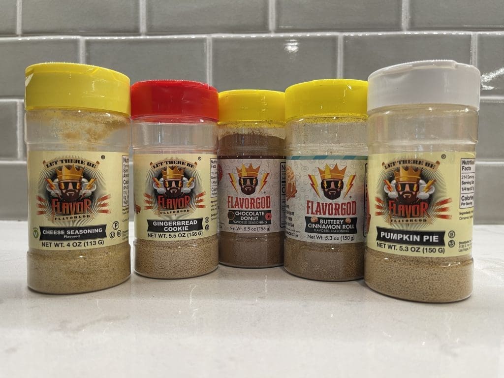 collection of Flavor God toppers for popcorn, vegetables, toast and other food.