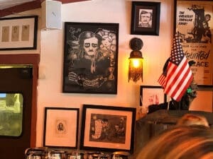 Poe's Tavern interior showing a portrait of Edgar Allan Poe