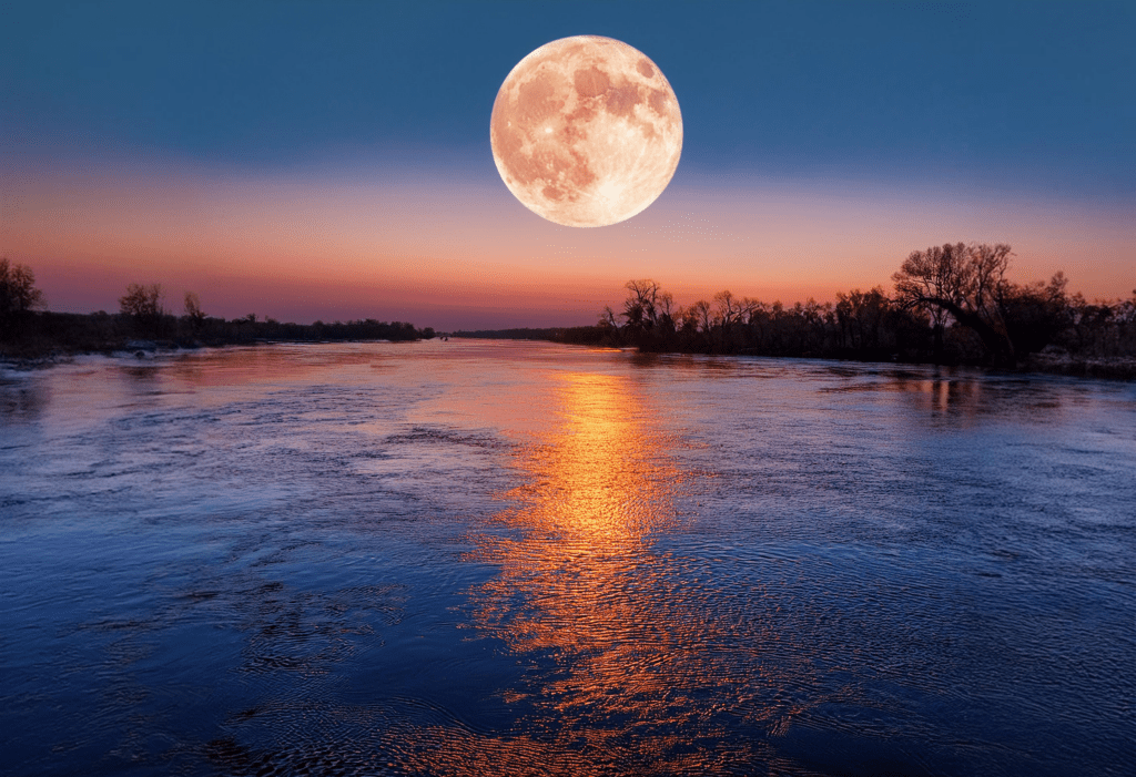 Doobie Brothers on Tour moon rising over the Mississippi River